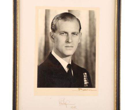A photo portrait of Prince Philip to Kirkland Bridge of the National Playing Fields Association, signed by Prince Philip, dat