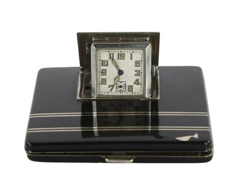 An Art Deco compact / travel clock, in black lacquer and silver plate detail, 7.5cm sqSome missing chips of lacquer on top of