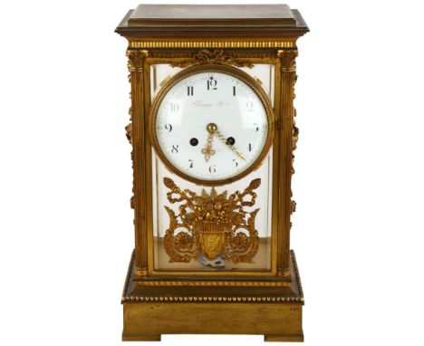 A mid 19th century French Four Glass clock by Raingo Feres, Paris,  8 day movement, case has bevelled glass and applied decor