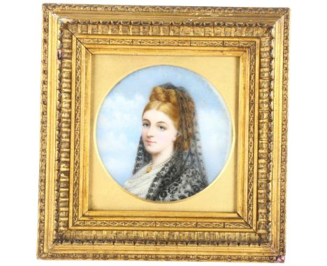 An 18th century painted portrait of a veiled lady on porcelain panel, in gilt frame, original backing dated 1833, painted in 