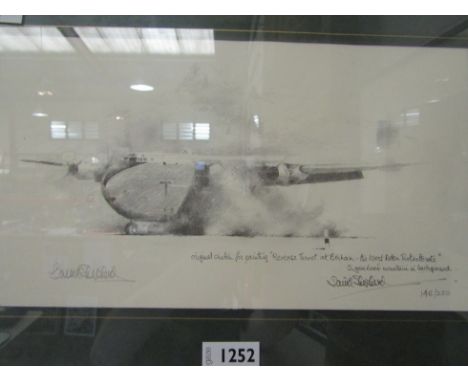 A signed limited edition print after David Sheperd of an aircraft, 148/250, framed and glazed 19 x 34cm 