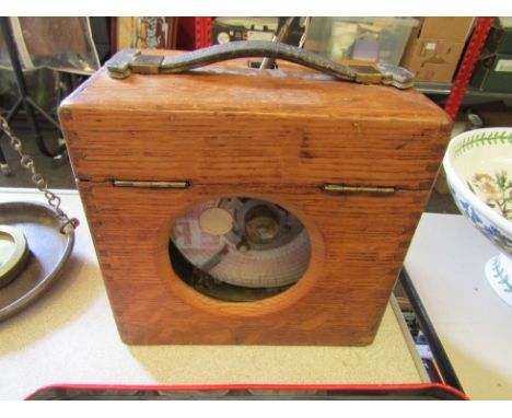 A cased pigeon racing clock retailed by B. Leete &amp; Sons, the glass etched "Toulet Imperator" (with key) 