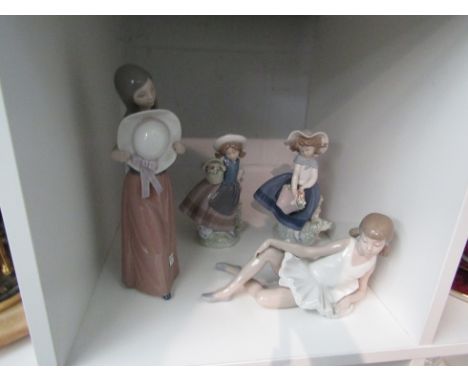 Three Lladro figures of young ladies together with a Nao figure of a ballet dancer (4) 