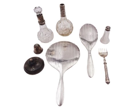 Group of silver mounted items, to include hand mirror and hair brush, each with vertical bands of engine turned decoration, t