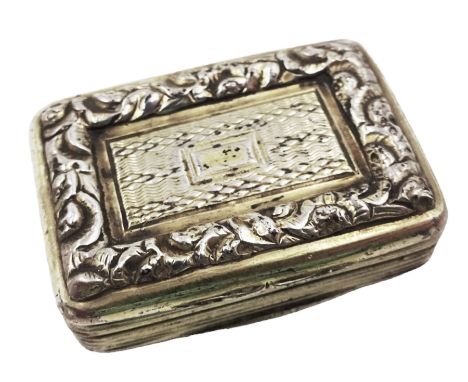 George III silver-gilt vinaigrette, of rectangular form, with rounded corners, with rim embossed in high relief with floral d