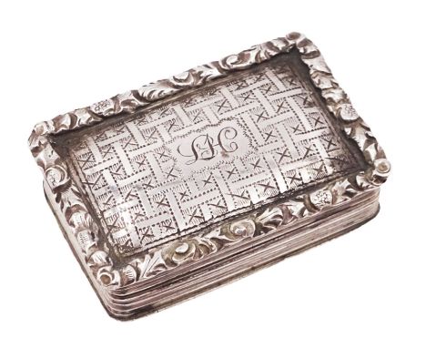 George III silver vinaigrette, of typical rectangular form, with raised foliate rim and engine turned decoration, with banded