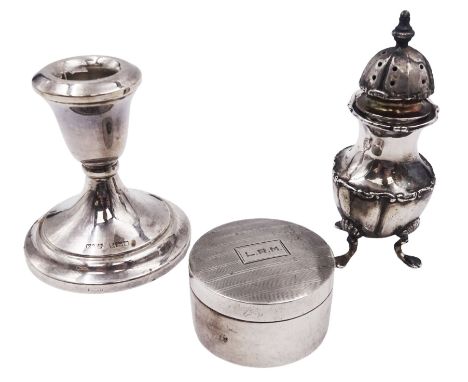 Silver tape measure dispenser, of circular form, with engine turned decoration and engraved initials to cover, opening to rev