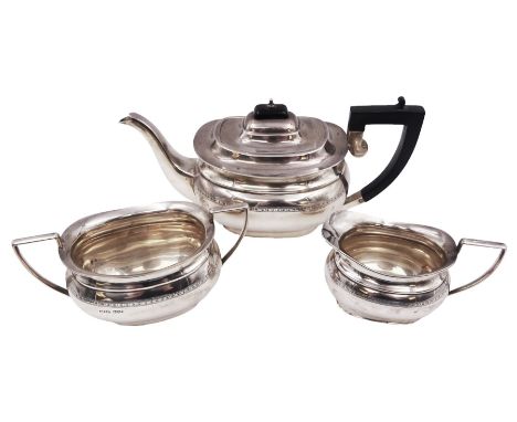 1930s silver three piece tea service, comprising teapot, milk jug and twin handled open sucrier, each of oval bellied form, w