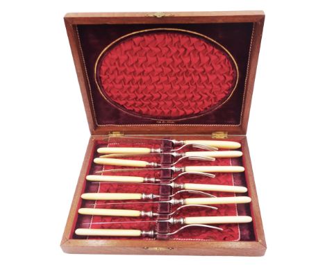 Set of Victorian silver fish knives and forks for six place settings, closely matched, the silver blades and prongs with engr