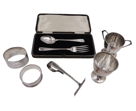 Group of silver, to include 1920s silver egg cup, modelled as a tyg with three angular handles, hallmarked James Deakin & Son