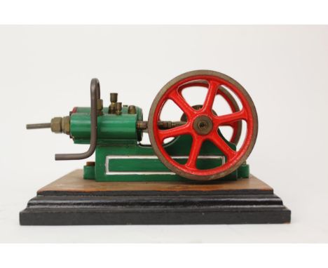 A kit built model stationary line steam Poppet valve engine, with twin flywheels, based on an original by Samuel G Jowitt, 7.