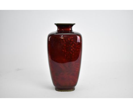 A Japanese cloisonne ginbari enamel vase, Taisho / Showa, of shouldered form, in deep red enamel over embossed foil ground wi