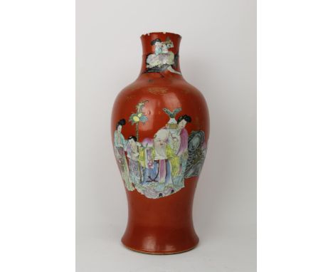 A Chinese late Qing vase of baluster form decorated with official attendants holding fruit, a vase of peacock feathers and a 