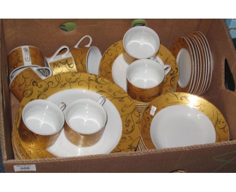Modern part coffee and dinner service on a white ground with yellow banding and gilt decoration, comprising: coffee cans and 
