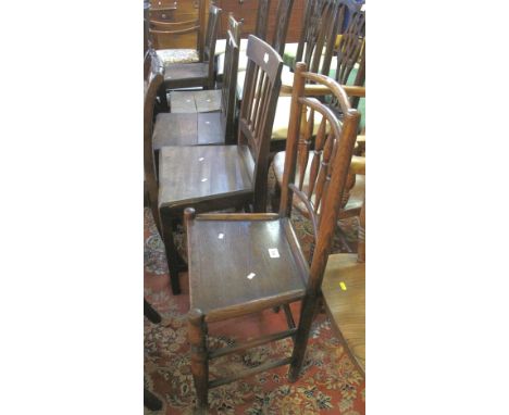 Four similar 19th Century stick back farmhouse kitchen chairs, together with 19th Century ash and elm spindle back chair. (5)
