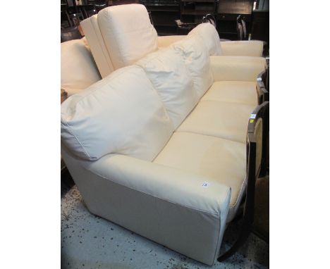 Modern cream leather five piece suite comprising: large three seater sofa; two seater sofa; pair of armchairs and a pouffe. (