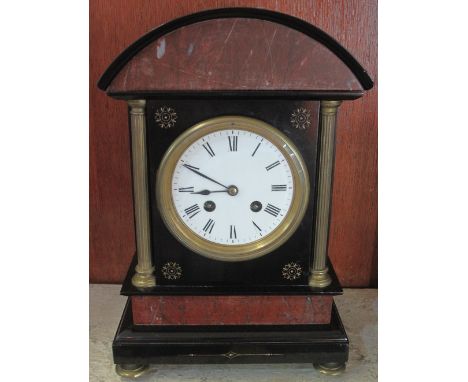 Late 19th Century black slate and marble two train, architectural, domed mantel clock with enamelled face, having Roman numer