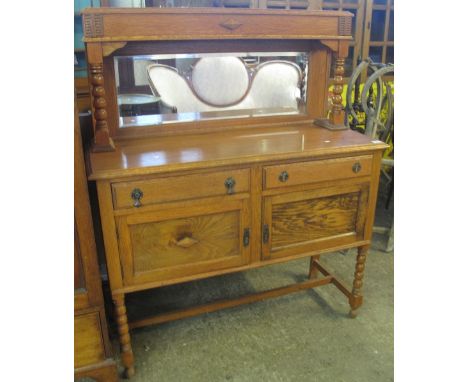 Early 20th Century oak mirror back bevel plate sideboard with bobbin turned supports.(B.P. 24% incl. VAT)
