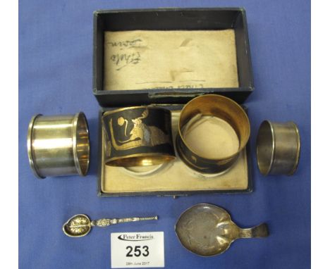 Cased Egyptian design napkin rings, two silver napkin rings, caddy spoon and small apostle type spoon.(B.P. 24% incl. VAT)