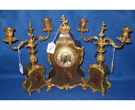 French florally decorated and gilt metal mounted clock garniture, comprising balloon shaped clock with enamel and gilt metal 