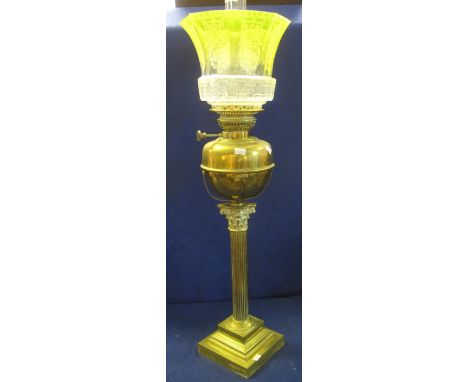 Early 20th Century brass oil lamp with brass reservoir on a Corinthian column stepped, square brass base, having etched glass