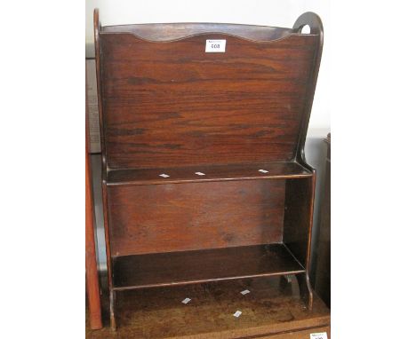 20th Century oak magazine rack with under shelf.(B.P. 24% incl. VAT)