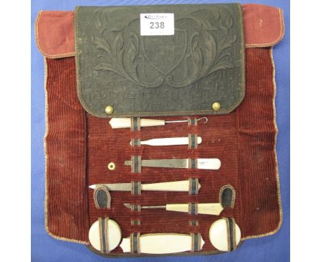 Foliate and shield design lady's travel vanity case comprising: comb; button hook; various files etc.(B.P. 24% incl. VAT)