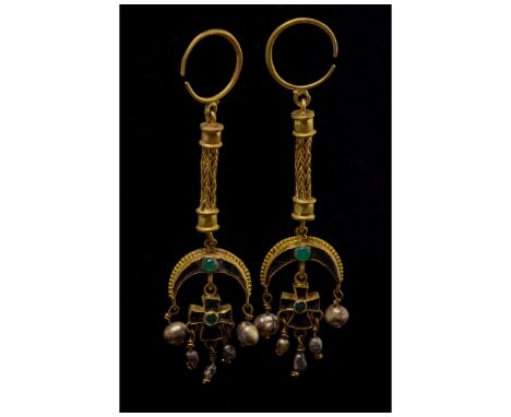 C. 1100-1300 AD. Byzantine. A stunning pair of elaborate gold earrings comprising an open, circular hoop, elongated woven cor