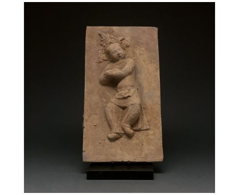 Ca.960-1279 AD. Chinese Song Dynasty. A buff-coloured, rectangular brick with a dancer depicted in high relief. The dancer, w