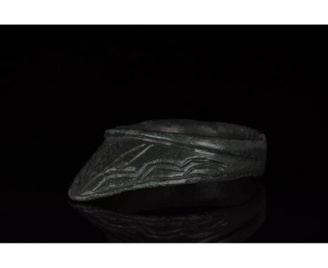C. 1000-1500 AD. Crusader period. A bronze archerâ€™s ring comprising a circular hoop and projecting triangular guard bearing