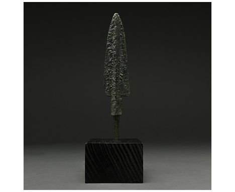 1200-700 BC, Greek Archaic Period. A bronze spearhead with a triangular, lentoid-sectioned blade with a raised midrib, short 