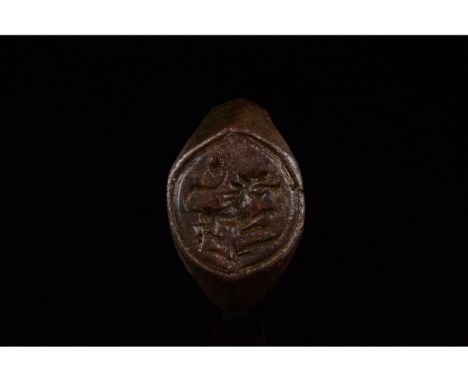 C. 1000-1500 AD. Crusader period. A bronze ring with a circular hoop and elliptical bezel, bearing an engraved prancing lion.
