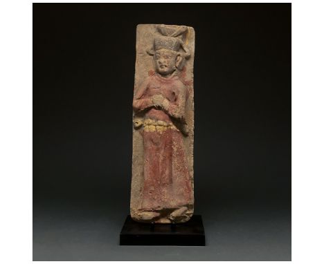 Ca.960-1279 AD. Chinese Song Dynasty. A cream-coloured, rectangular brick with an attendant figure depicted in high relief. T