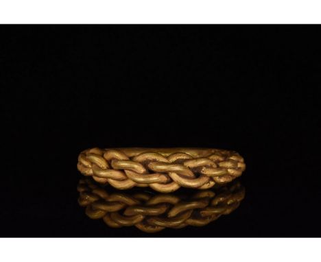 c. 900-1100 AD. Viking Age. Twisted gold ring comprising of circular hoop comprised of interwoven strands of gold. This ring 