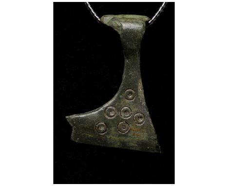 700-1100 AD, Viking Age. A bronze example of an axe or Perun amulet comprising a suspension loop and a stylised axe with a no