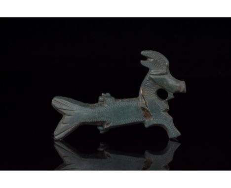 100-300 AD. Roman. A rare bronze plate brooch in the form of a Capricorn â€“ a mythological sea beast with the head and legs 