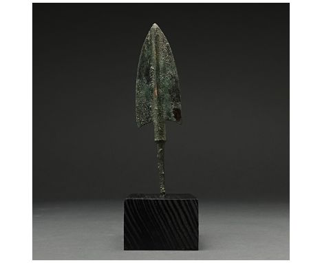 1200-700 BC, Greek Archaic Period. A squat bronze spearhead with an slightly barbed leaf-shaped, lentoid-sectioned blade, rai
