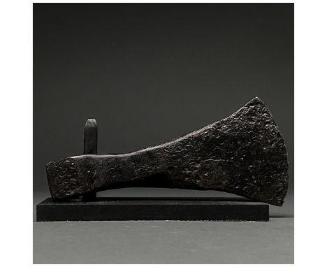c. 900-1100 AD. Viking age. An iron axe head comprising a curved, fan-shaped blade, tapering cheek and rounded socket. The er