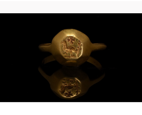 CA. 600 AD. BYZANTINE GOLD RING WITH BIRD AND CROSS. In order to confirm its authenticity, this piece has undergone X-Ray Flu