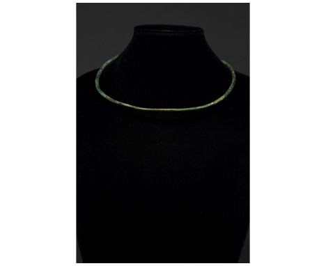 C. 900-1100 AD. Viking Period. This beautiful bronze torc has simple strand design with a an abstract sub-square serpentâ€™s 