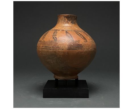 Ca. 1400-1200 BC. Canaanite. An unusual bronze age Canaanite painted ceramic vessel in a light brown fabric comprising a plan
