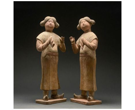 C. AD 618-907. Tang Dynasty. Two full-figured court attendant terracottas. Both of these court attendant ladies are posed wit