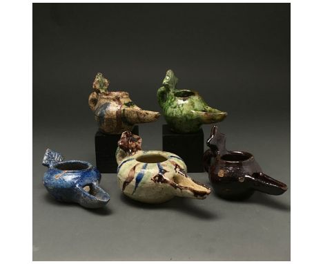 ca. 1100 AD. Seljuk. This lot of beautiful medieval Islamic period glazed lamps were probably made under the Seljuk dynasty. 