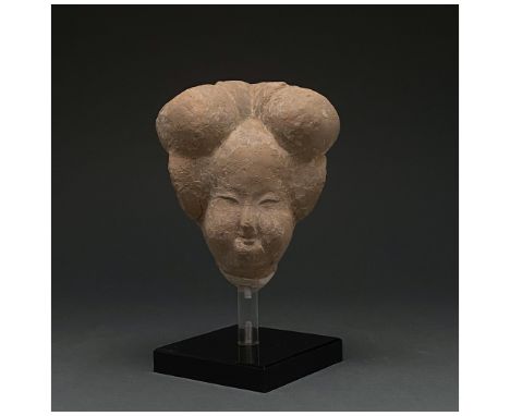 C. AD 618-907. Tang Dynasty. Terracotta head of a court lady. This beautiful ceramic depicts the full face of a well-off cour