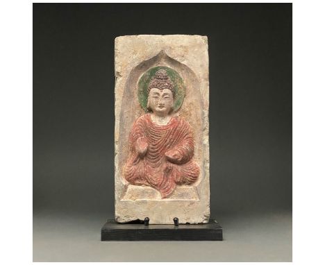 Ca. 500 AD. Chinese Northern Wei Dynasty. A terracotta brick in a cream-coloured fabric featuring a beautiful depiction of a 