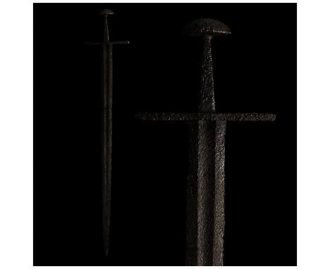 700-1000 AD. Viking age. An iron sword with a long, doubled-edged blade, culminating in a point with a wide, rectangular guar