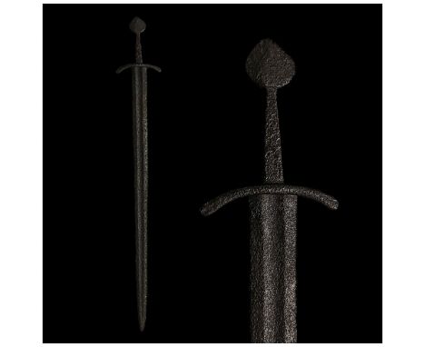 900-1100 AD. Viking age. An iron sword with a long, doubled-edged blade, with a deep fuller or "blood-groobe" culminating in 