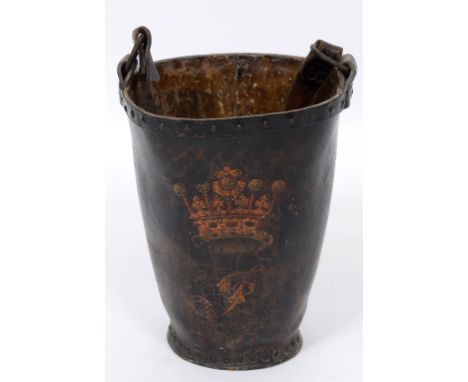 A late 18th/early 19th century leather fire bucket, decorated an armorial, 37 cm high, a walking stick and a whip (3)  See il