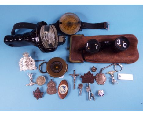 A Short & Mason Magnapole Series II compass, a diver's wrist compass, a Brinks Express Company chrome plaque, 32.5 cm wide, a