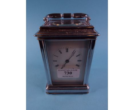 A carriage clock, the white enamel dial with Roman numerals, signed Geog Oram & S London, fitted a movement striking on a bel